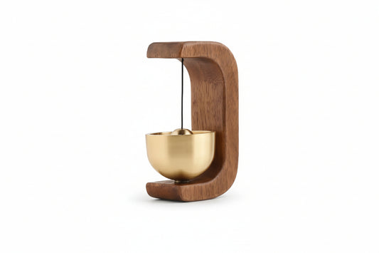 Decorative wall hook with a gold bowl on a white background